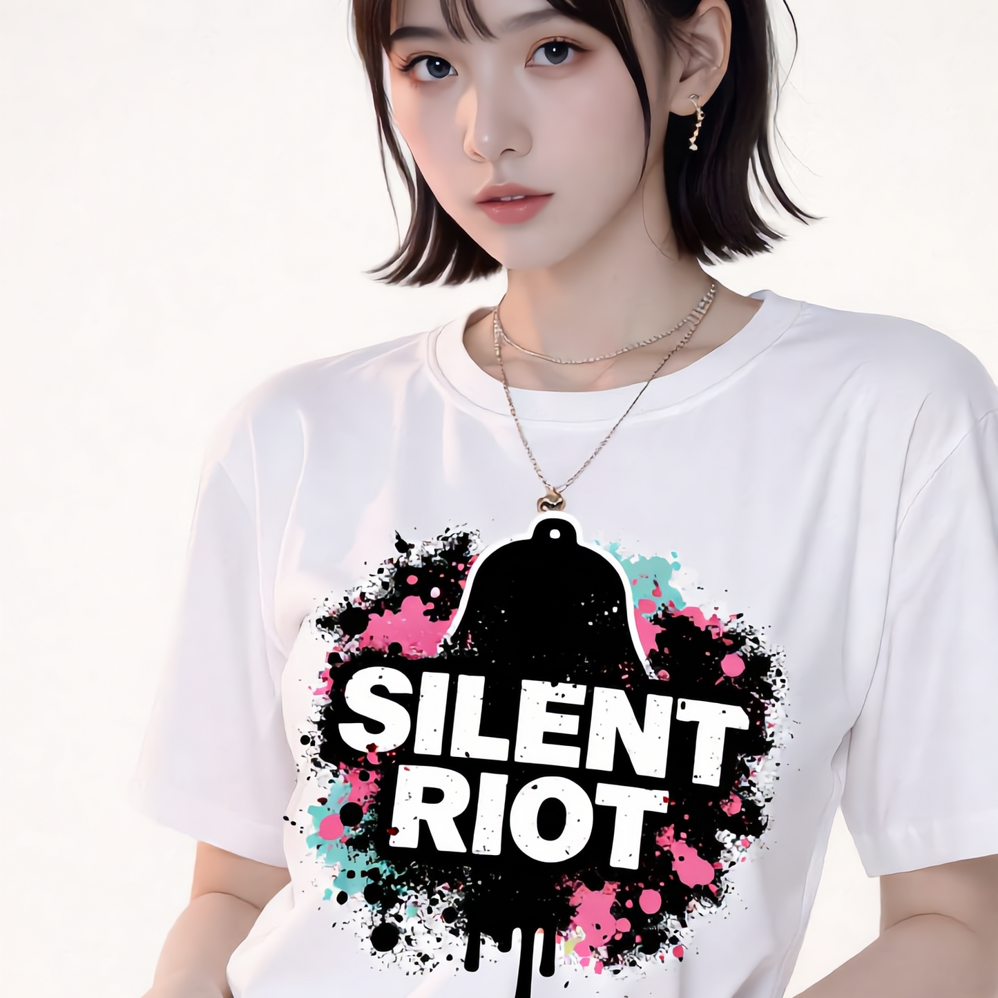 Person wearing a white t-shirt with 'Silent Riot' graphic design on a plain background